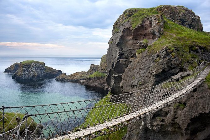 2-Day Northern Ireland Rail Tour: Belfast, Antrim Coast, and Giant's Causeway - Two days of rail travel, Belfast time, and Antrim Coast icons