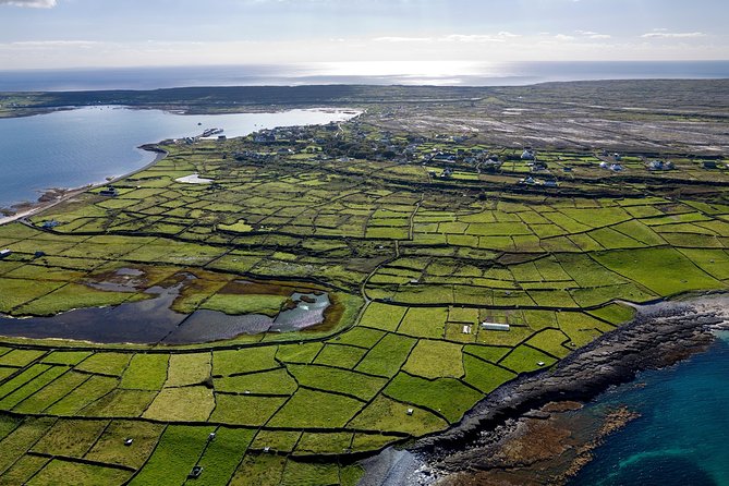 Aran Islands Scenic Flight and Galway Rail Tour from Dublin - Inis Mor by bus: limestone lanes, thatched cottages, and Celtic lore