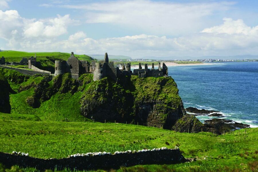 Dublin: Giant's Causeway, Dark Hedges & Titanic Guided Tour - Dunluce Castle ruins: a fast cliff-edge fix