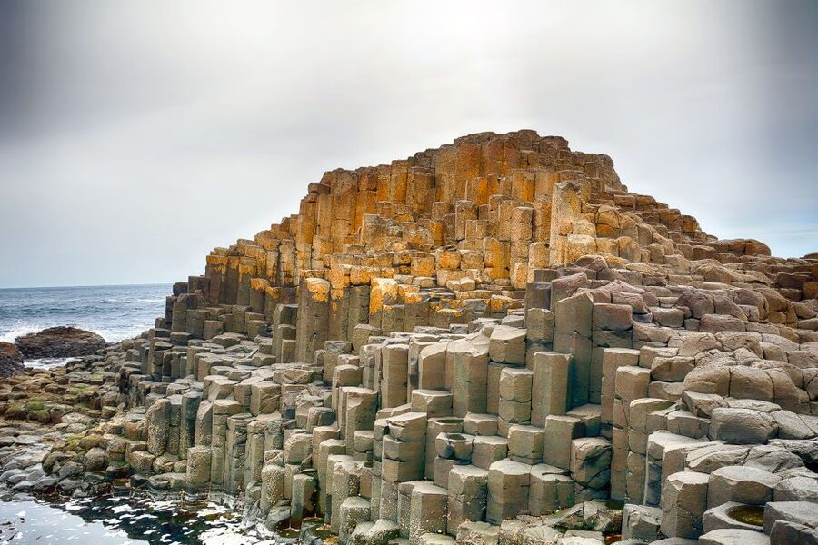 Dublin: Giants Causeway, Dark Hedges, Dunluce & Belfast Tour - Dunluce plus folklore plus context on the bus