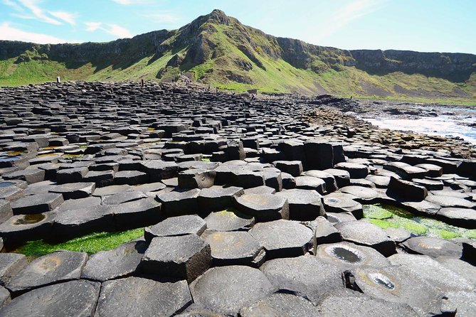 Dublin to Belfast Titanic, Dunluce Castle & Giant's Causeway Tour - Titanic Belfast in 2 Hours: Nine Galleries and Hands-On Sinking Story