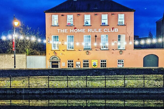 Wicklow Mountains and Kilkenny City Private Tour with Chauffeur - Glendalough: St Kevins Cross, a Round Tower, and Lake Walks